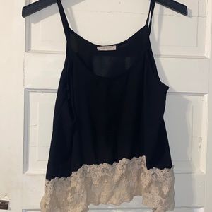 Women’s black tank top with cream lace